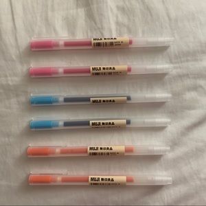 Muji 0.38 light pink, light blue, and orange Pen